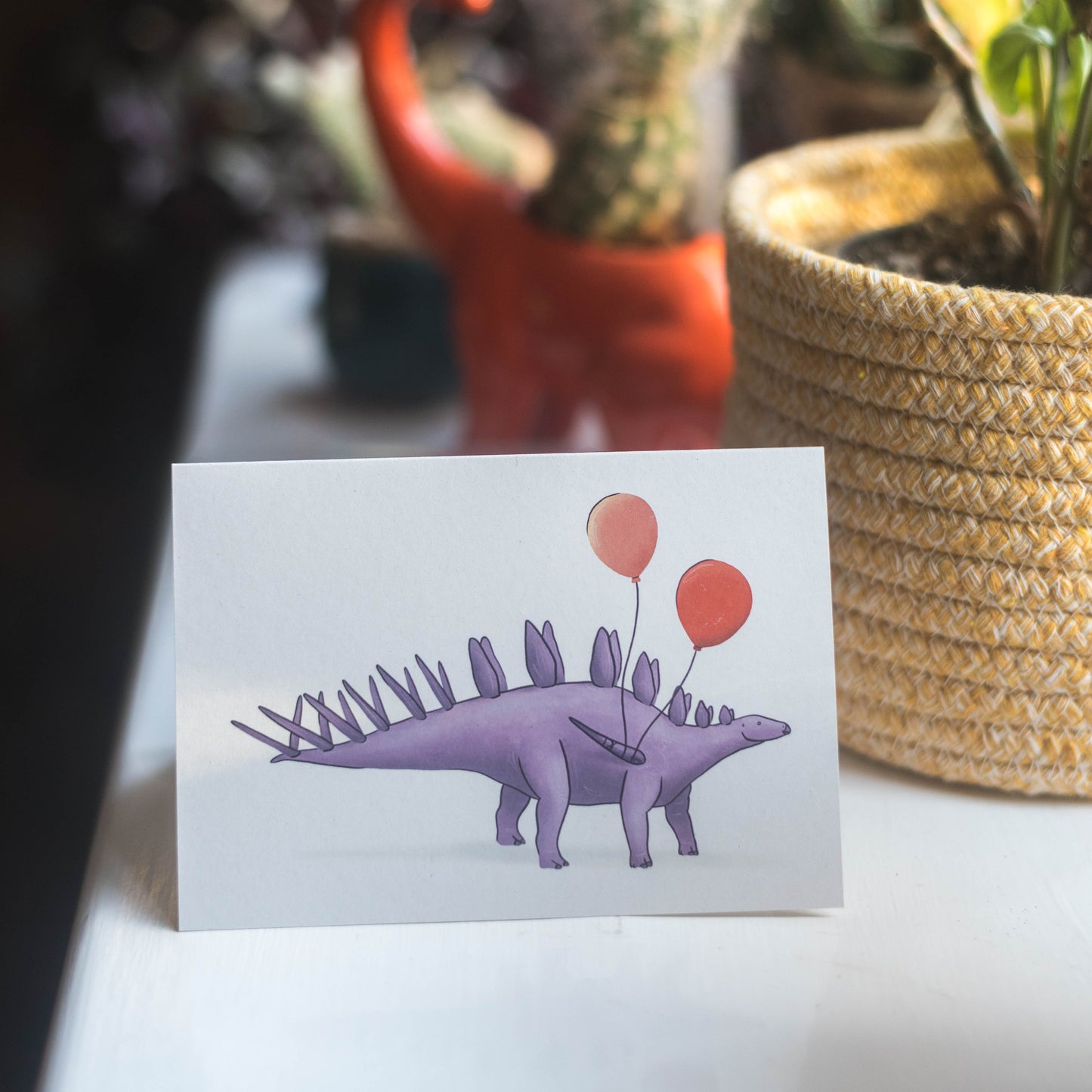 Balloon Kentrosaurus Greetings Card